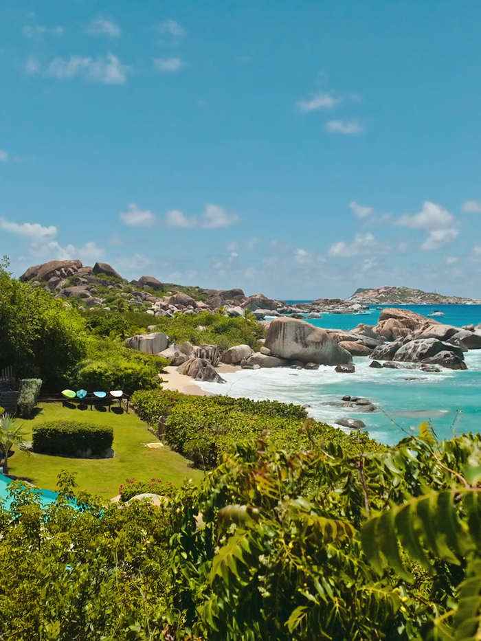 Aerial view of a Virgin Gorda coastline with luxury villas above the sea